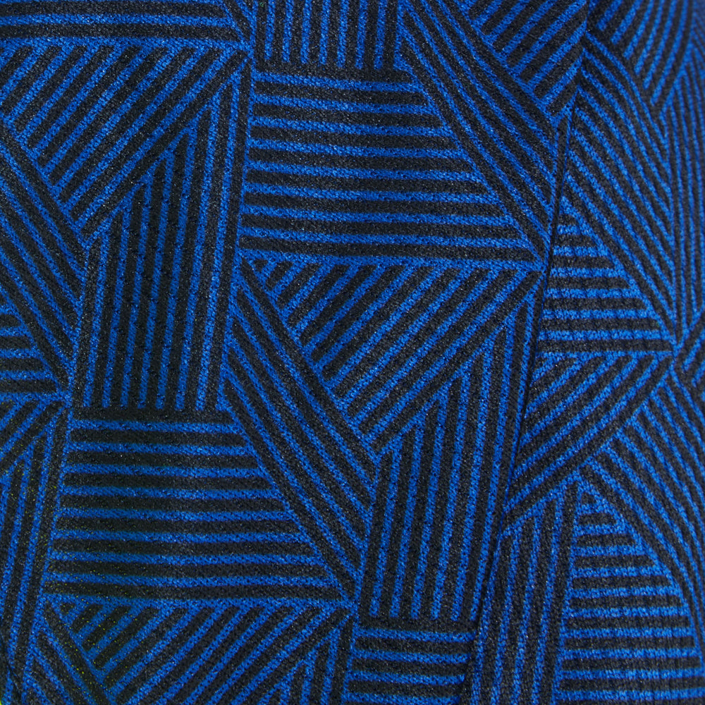 Close-up of navy geometric patterned fabric from Leo EcoViz T-shirt sleeve.