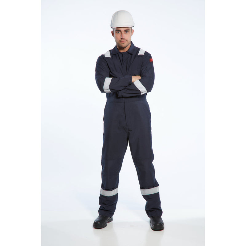 Worker adjusting cuff on the Portwest Araflame Gold Coverall AF53 sleeve.