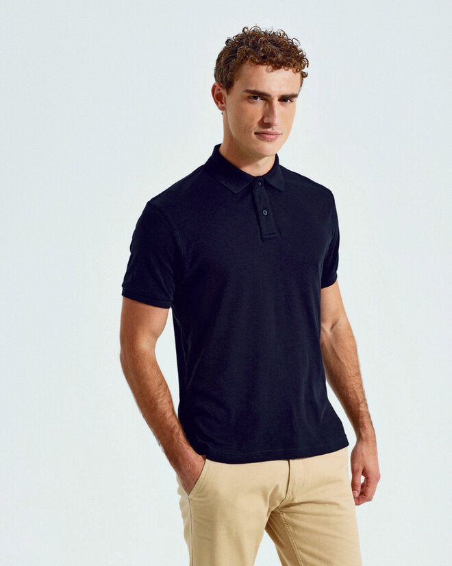 Collection of Asquith and Fox men's super smooth knit polos AQ005 in multiple colors, folded together.