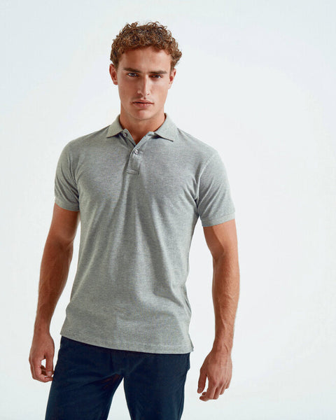 A colorful stack of the Asquith and Fox men's polycotton blend polos, model AQ015.