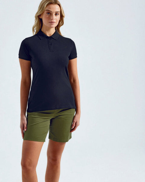 A stack of the colorful Asquith and Fox ladies' classic fit cotton polo shirts, model AQ020.