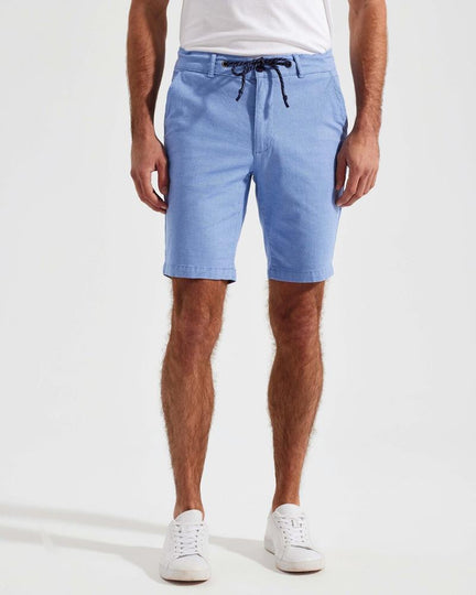 Model wearing Asquith and Fox men's everyday chino shorts AQ057 in a versatile stone color, showing the fit and length.