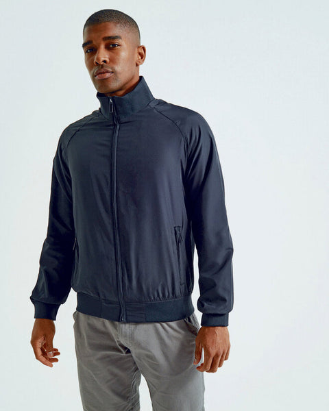 Man wearing the classic Asquith and Fox men's Harrington jacket AQ200, showing its stylish fit.