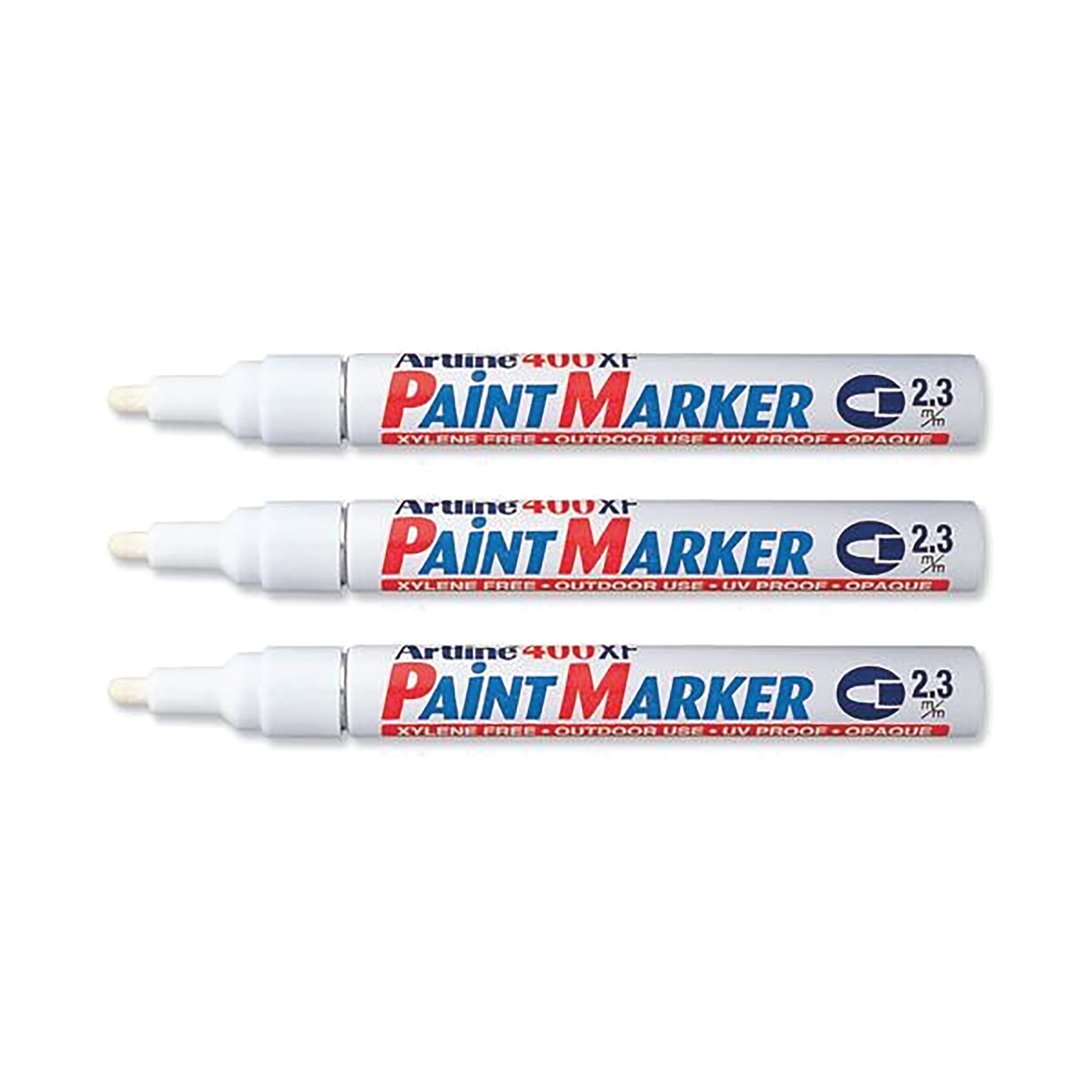 A white Artline 400 paint marker with its cap off, ready to use.