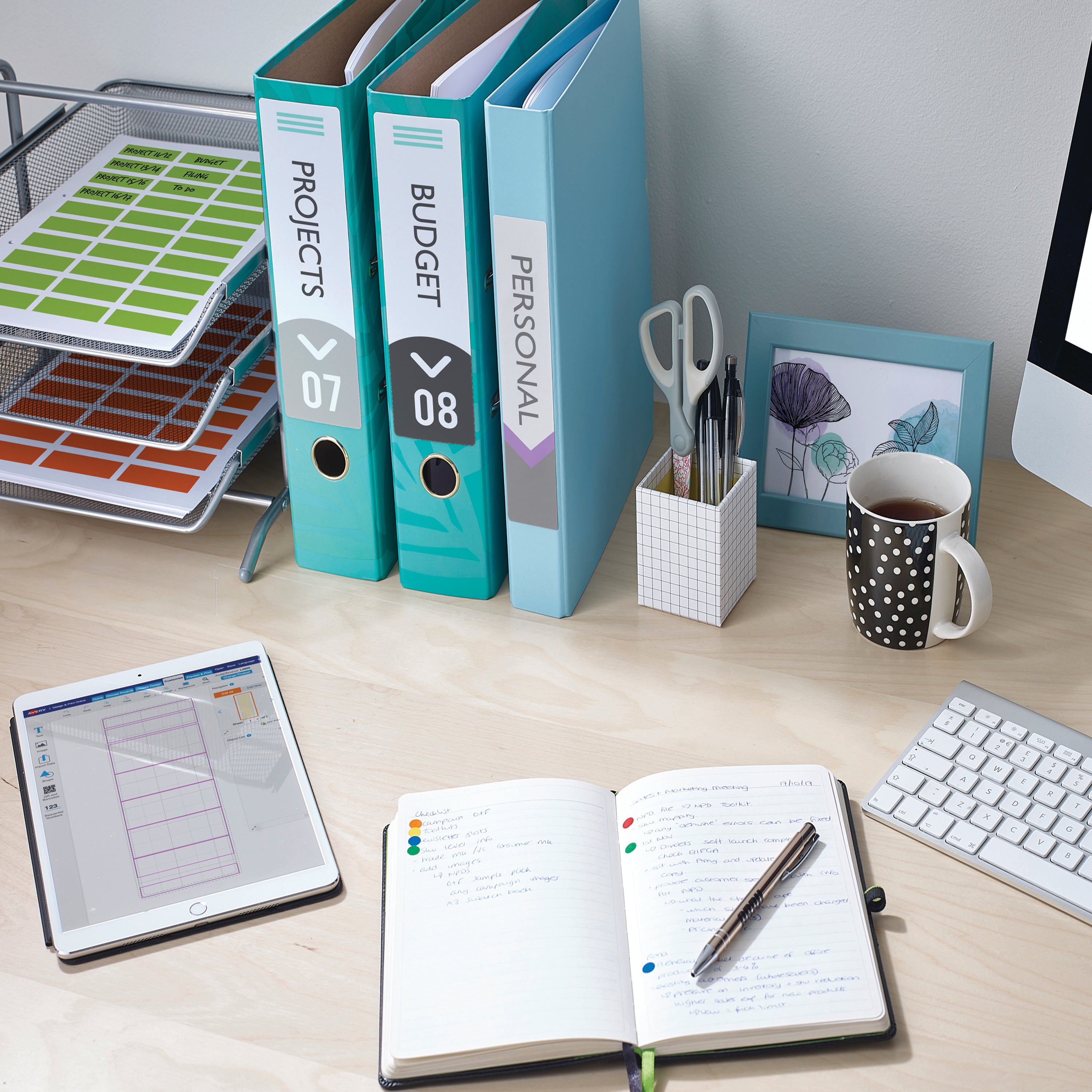 A shelf of renewed binders organized with Avery J8171 labels.