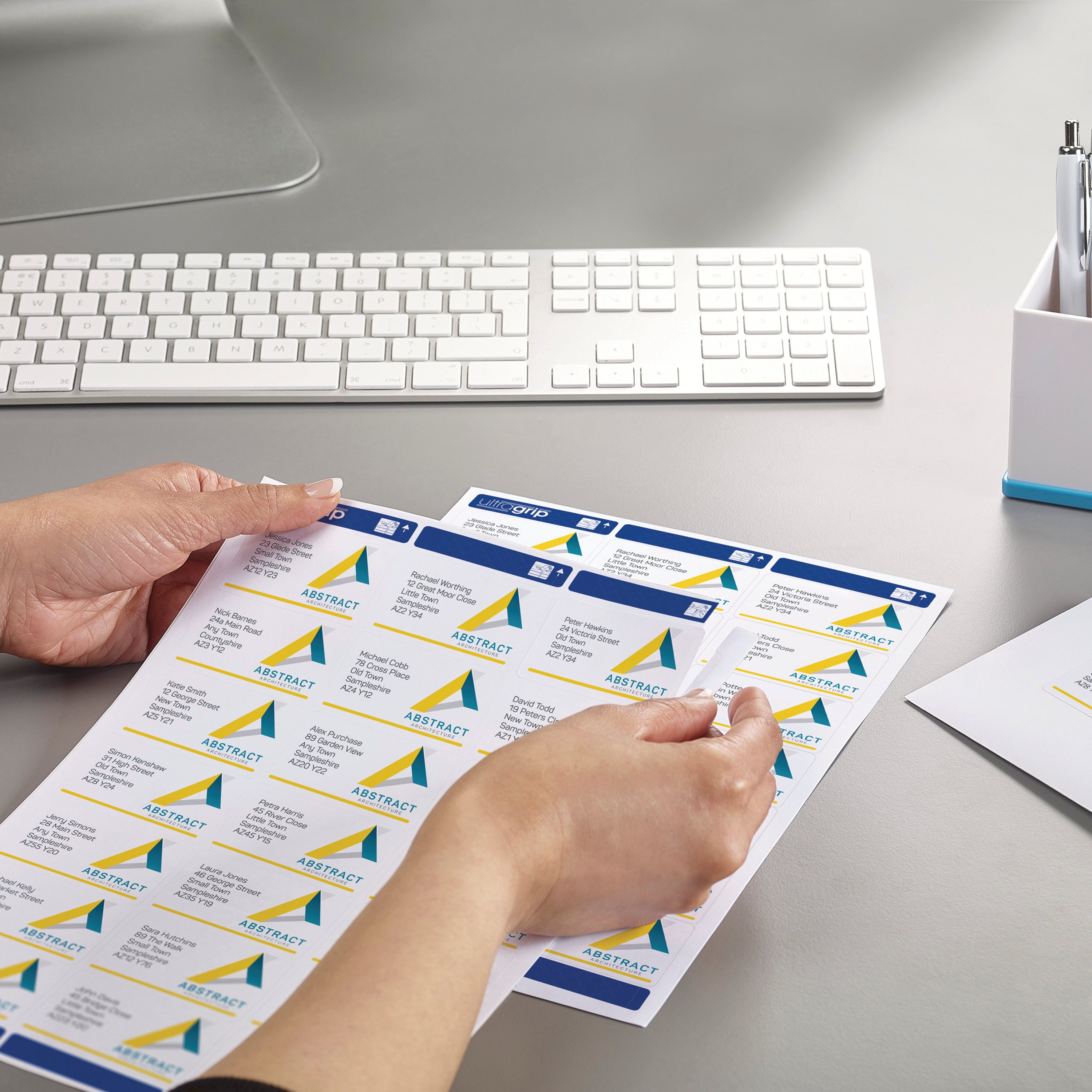 Lifestyle image showing Avery Ultragrip labels used for office organization.