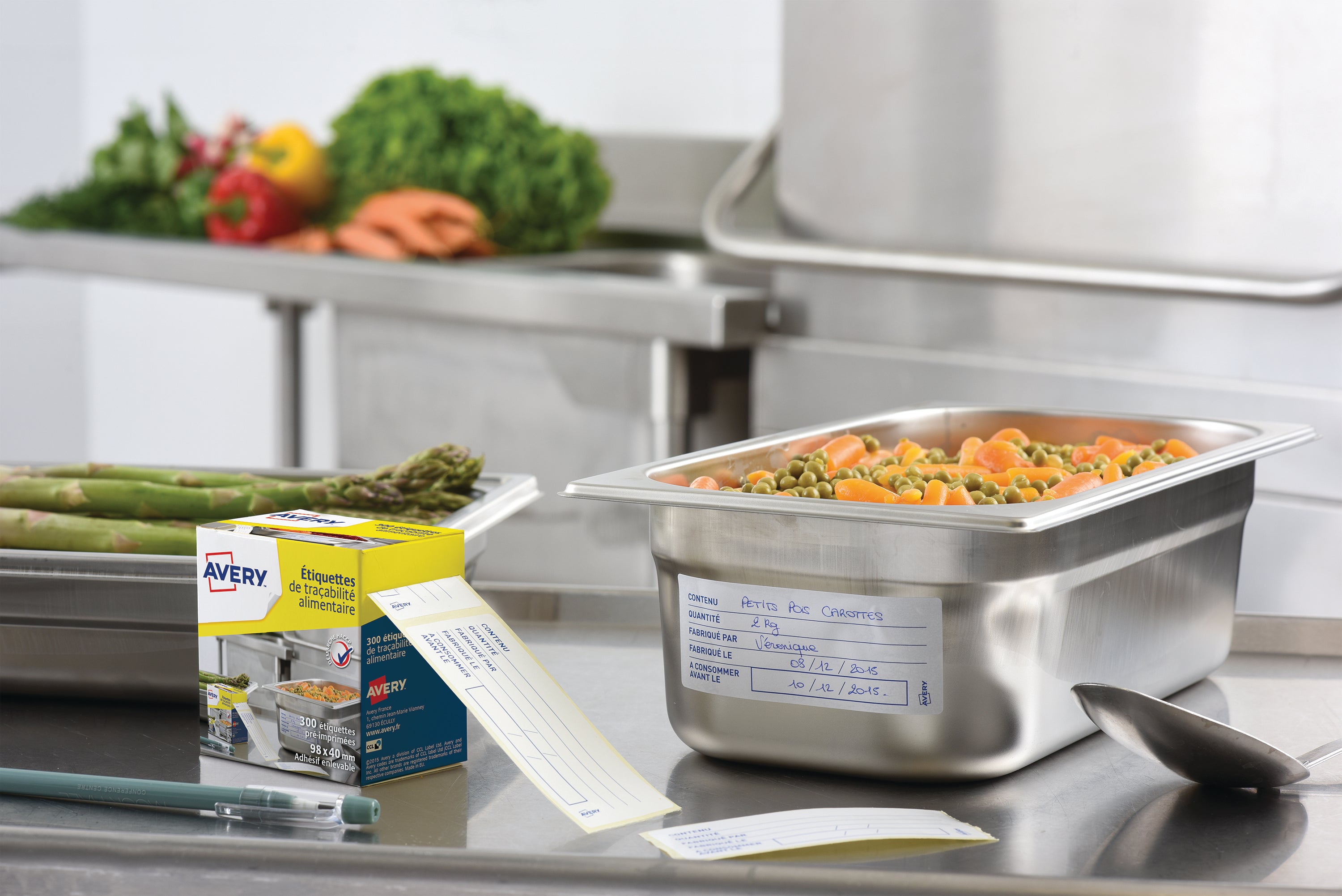 An Avery HACCP label applied to a food pan for safety compliance.