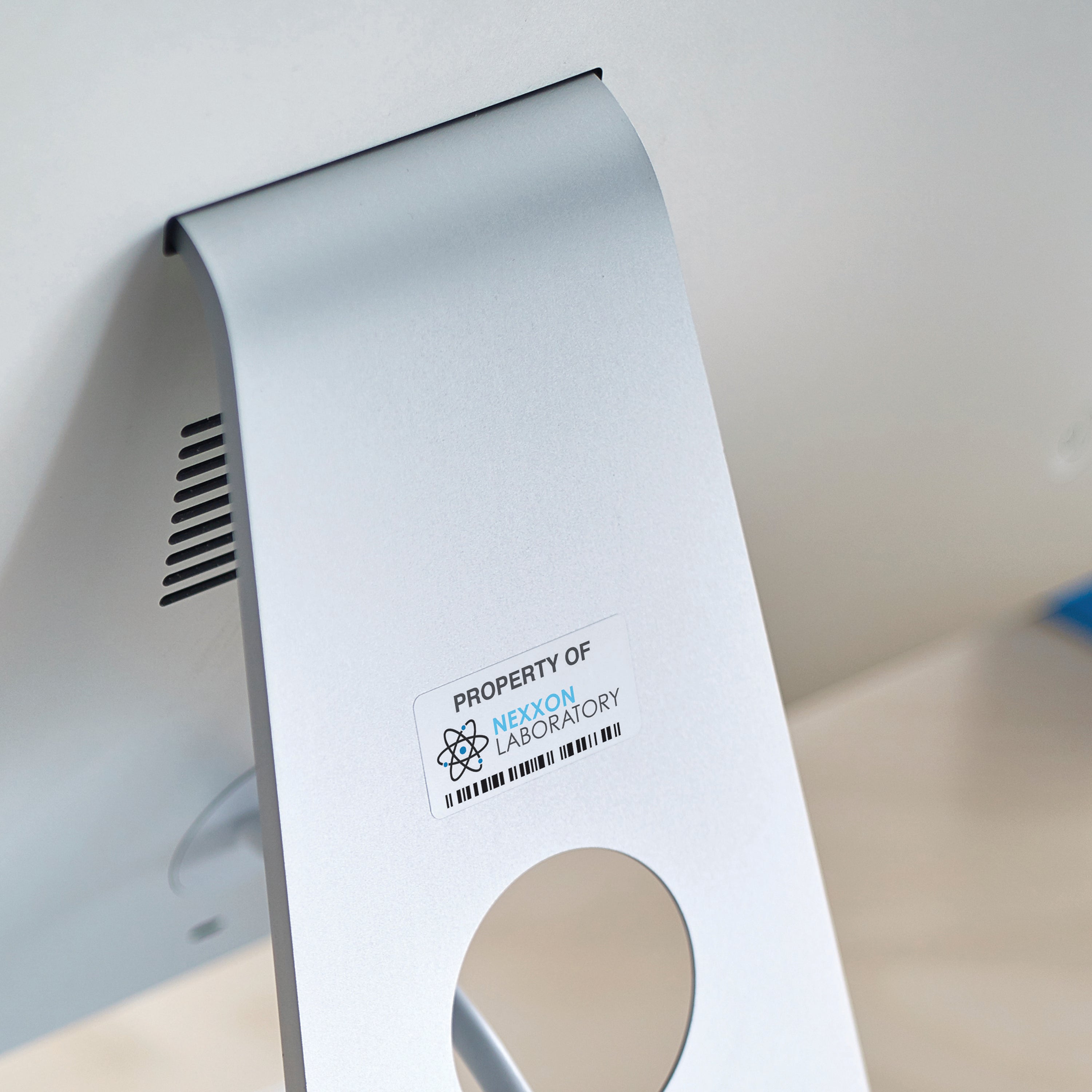 Demonstrating the strong adhesion of a small Avery heavy-duty label.