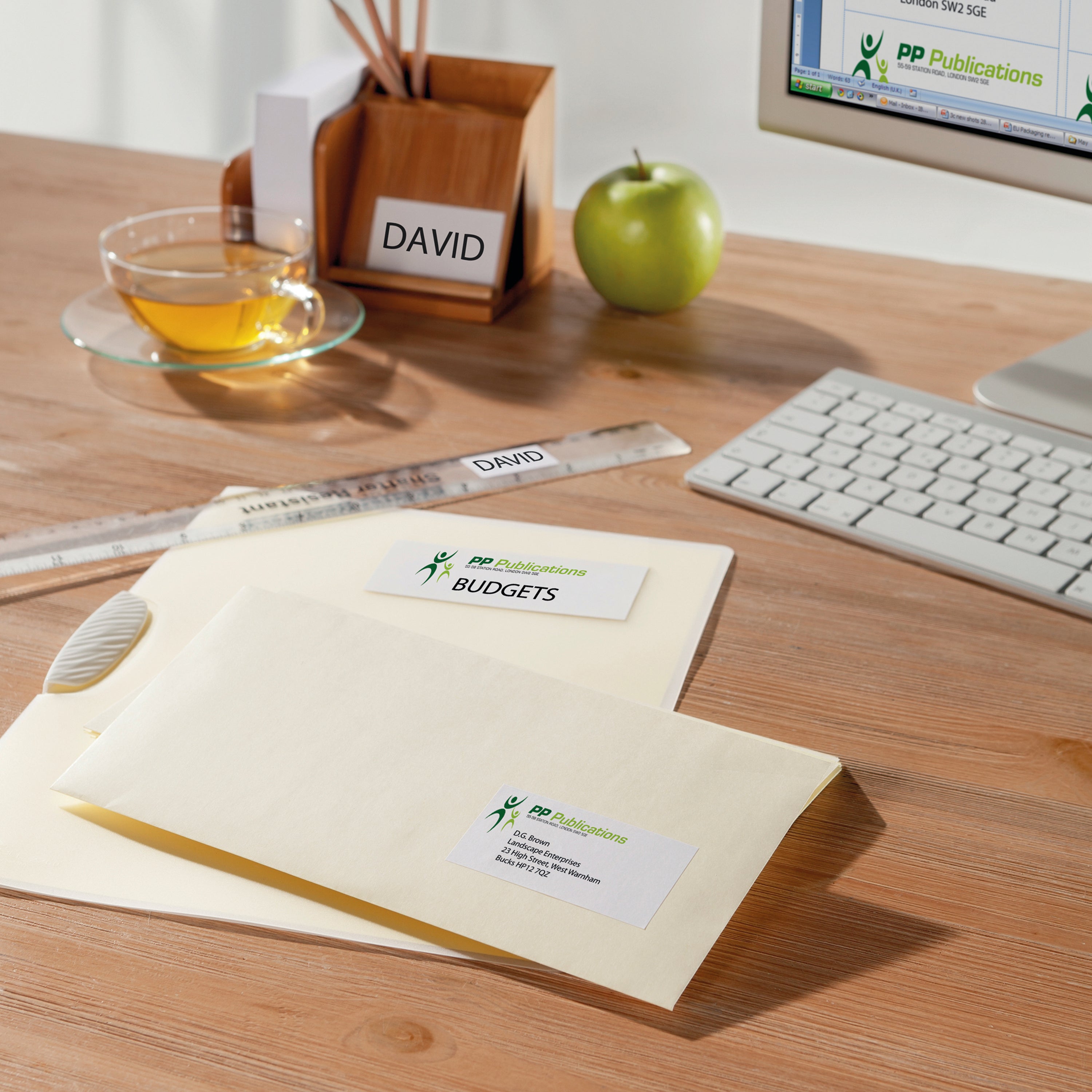 A neatly labeled folder using a temporary Avery removable label.