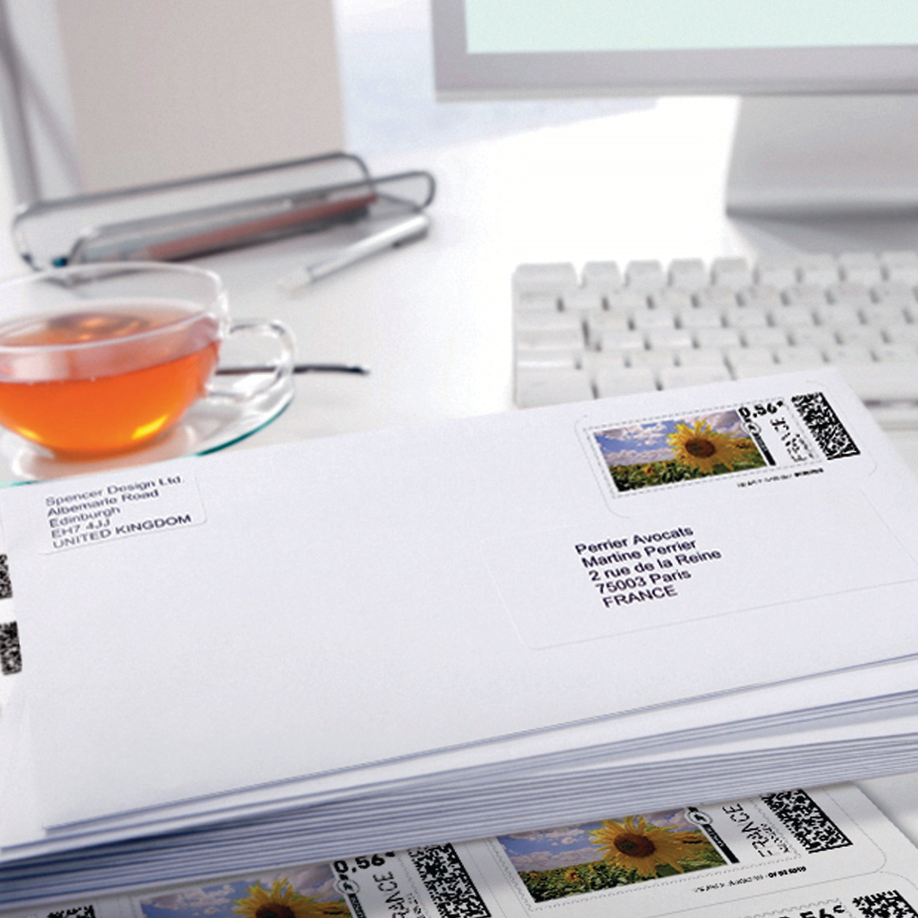 An Avery J8161 label neatly applied to a small folder for filing.