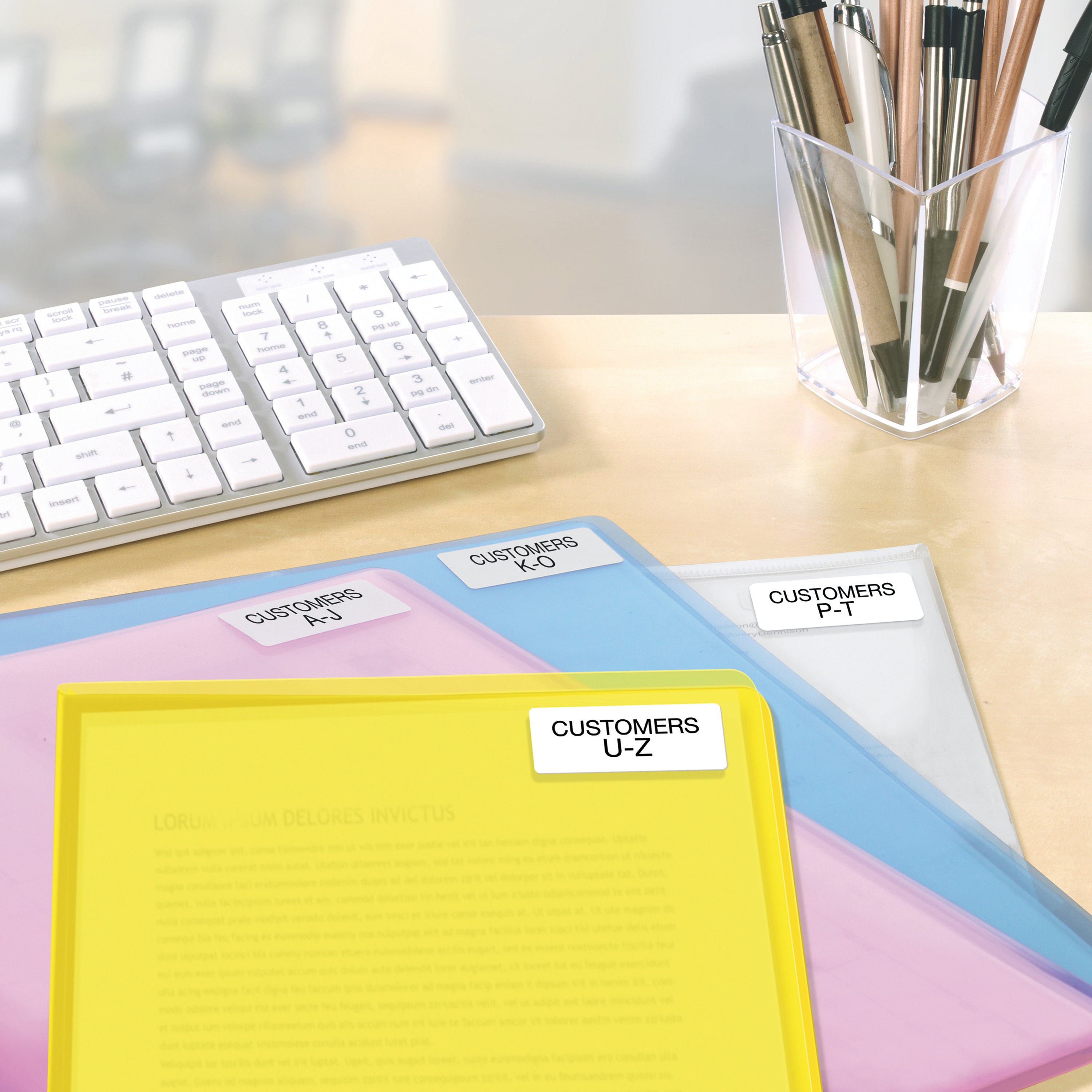 Avery L7656 labels used for marking and organizing small office items.