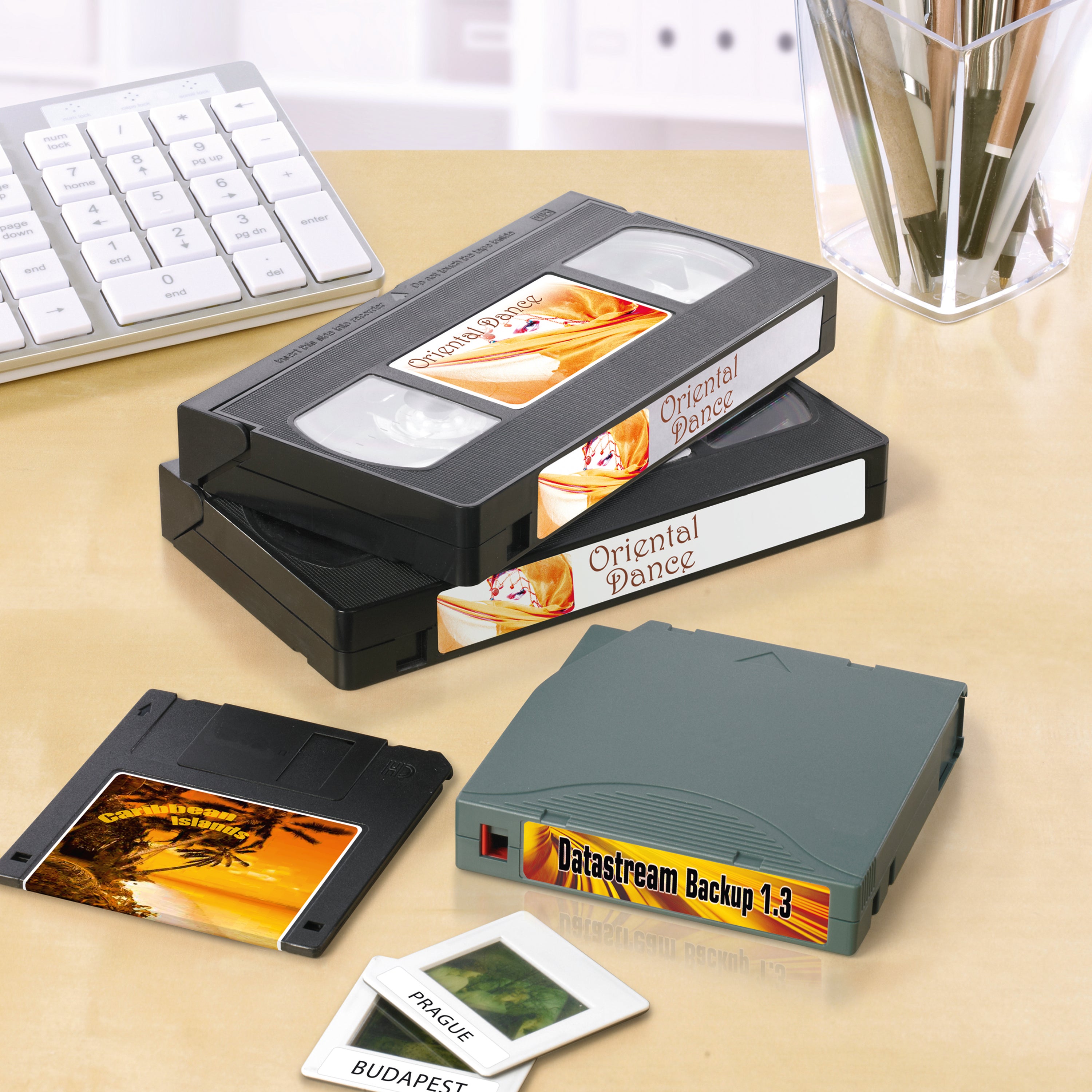 A stack of data cartridges neatly labeled with Avery L7665 labels.