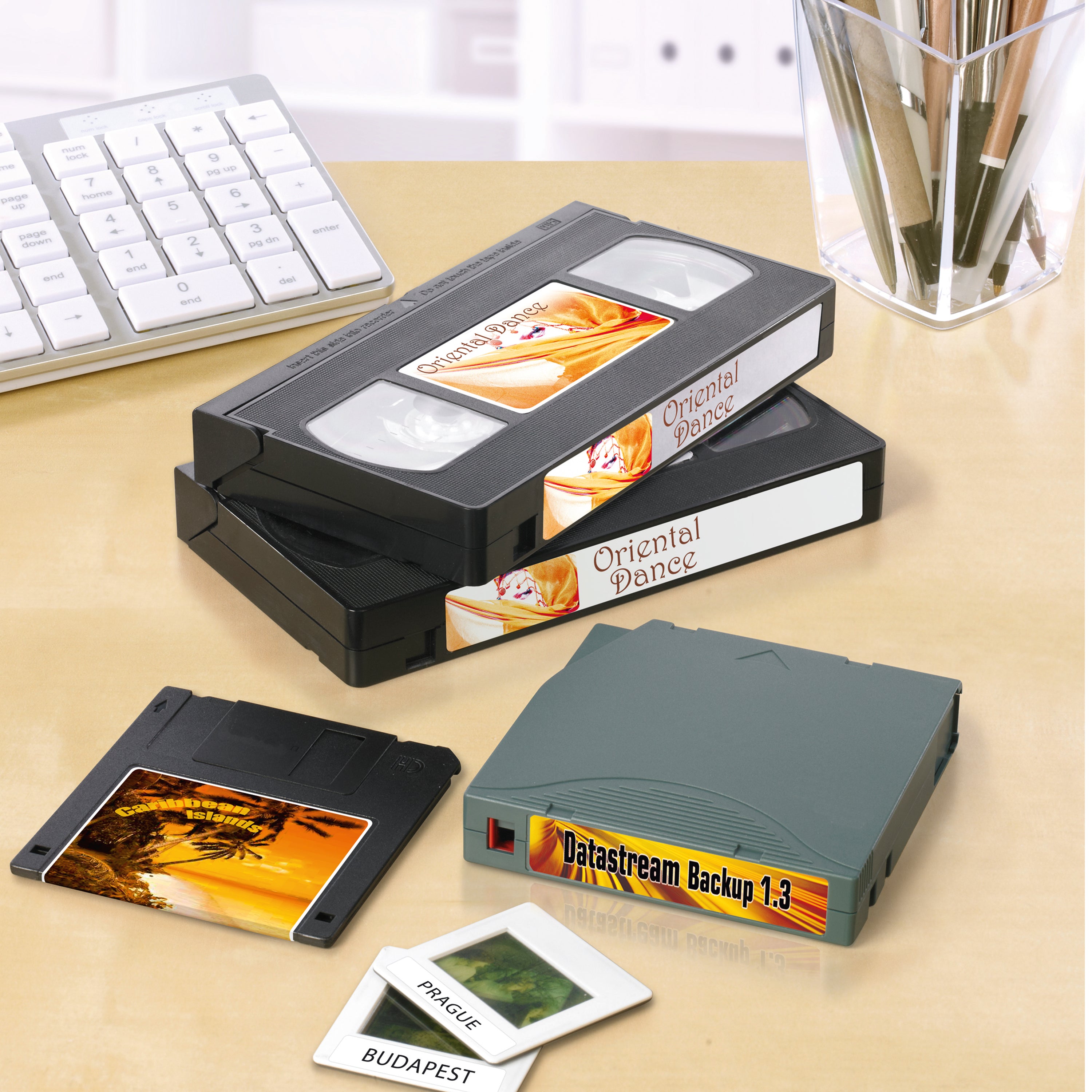 A library of video tapes organized with Avery L7674 spine labels.