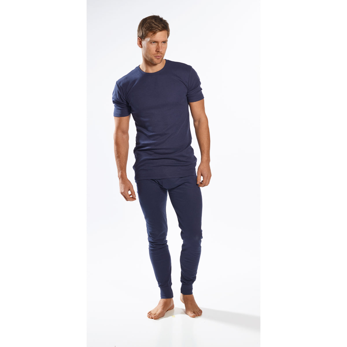 Side-angle shot of men’s navy ribbed thermal short-sleeve top and coordinating leggings