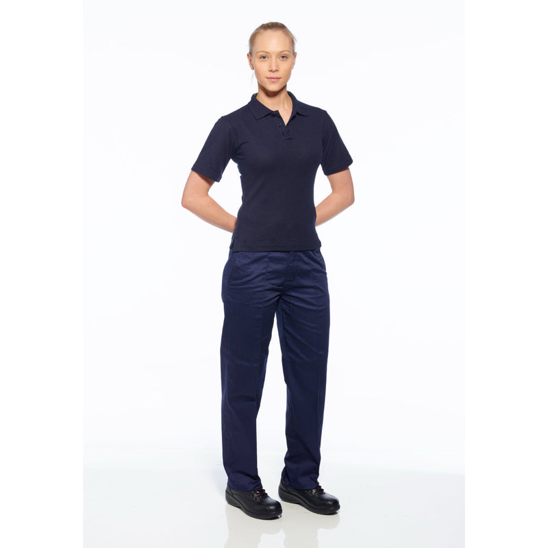 Model wearing the navy Portwest Women's Elasticated Trouser with a work polo and boots.