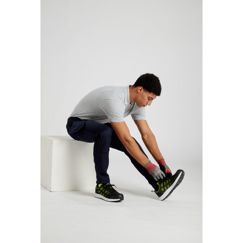 Safety trainer with black mesh upper, white sole, and reinforced toe
