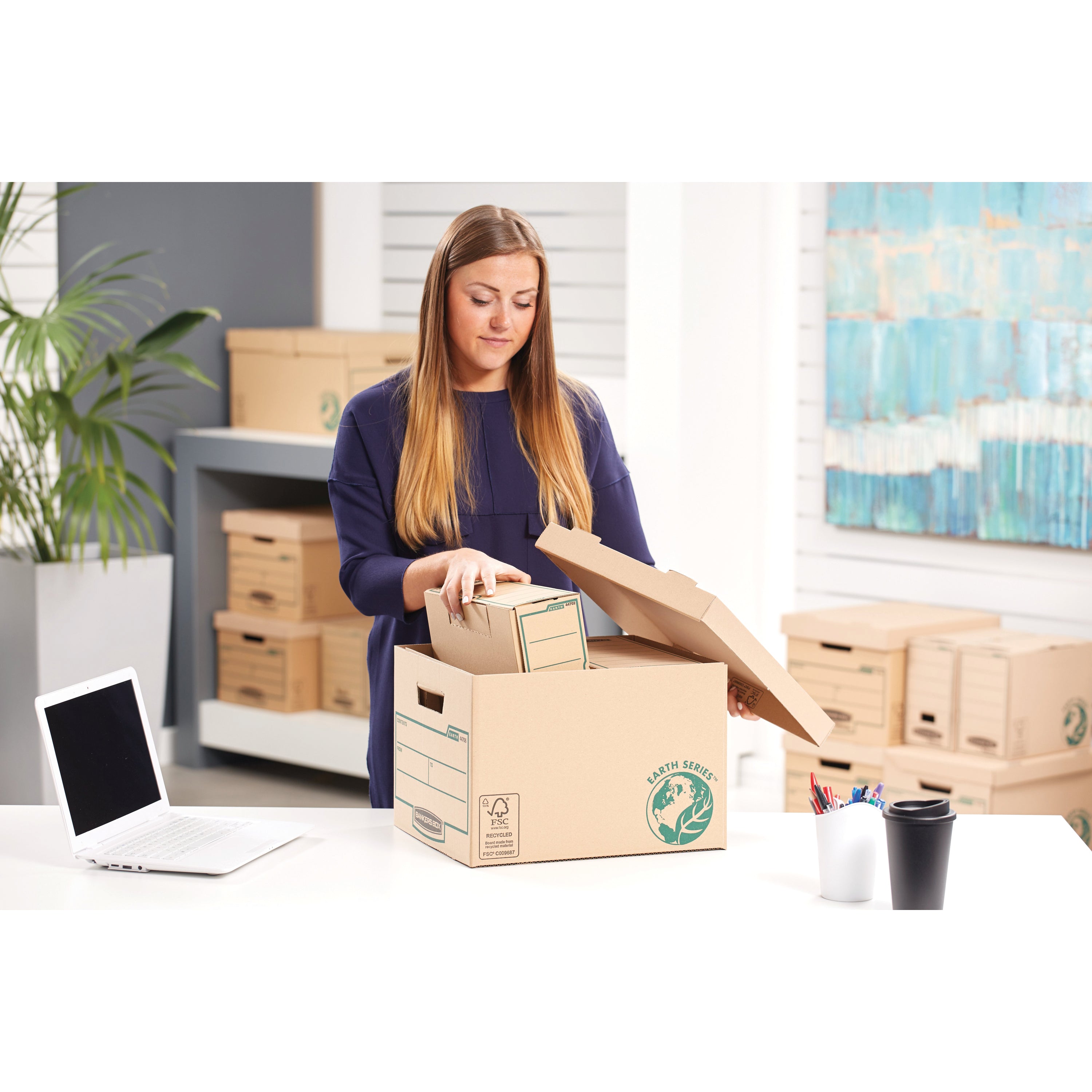 Brown Bankers Box R-Kive Earth storage box with reinforced hand holes.