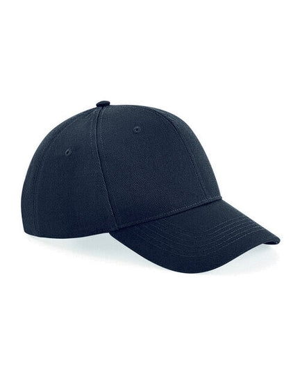 Flat lay of a navy blue Beechfield B18 6-panel baseball cap, top view.