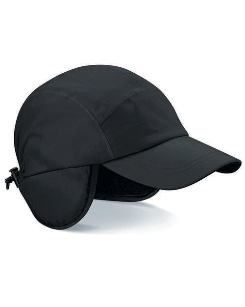 Top-down flat lay of a black Beechfield B355 canvas 5-panel cap.