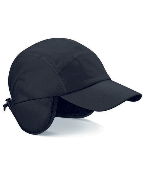 Top-down flat lay of a black Beechfield B355 canvas 5-panel cap.