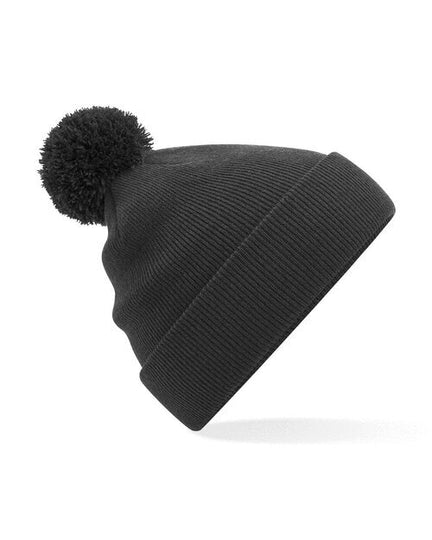 Black Beechfield B426 cable knit bobble hat with a pom pom, laid flat.