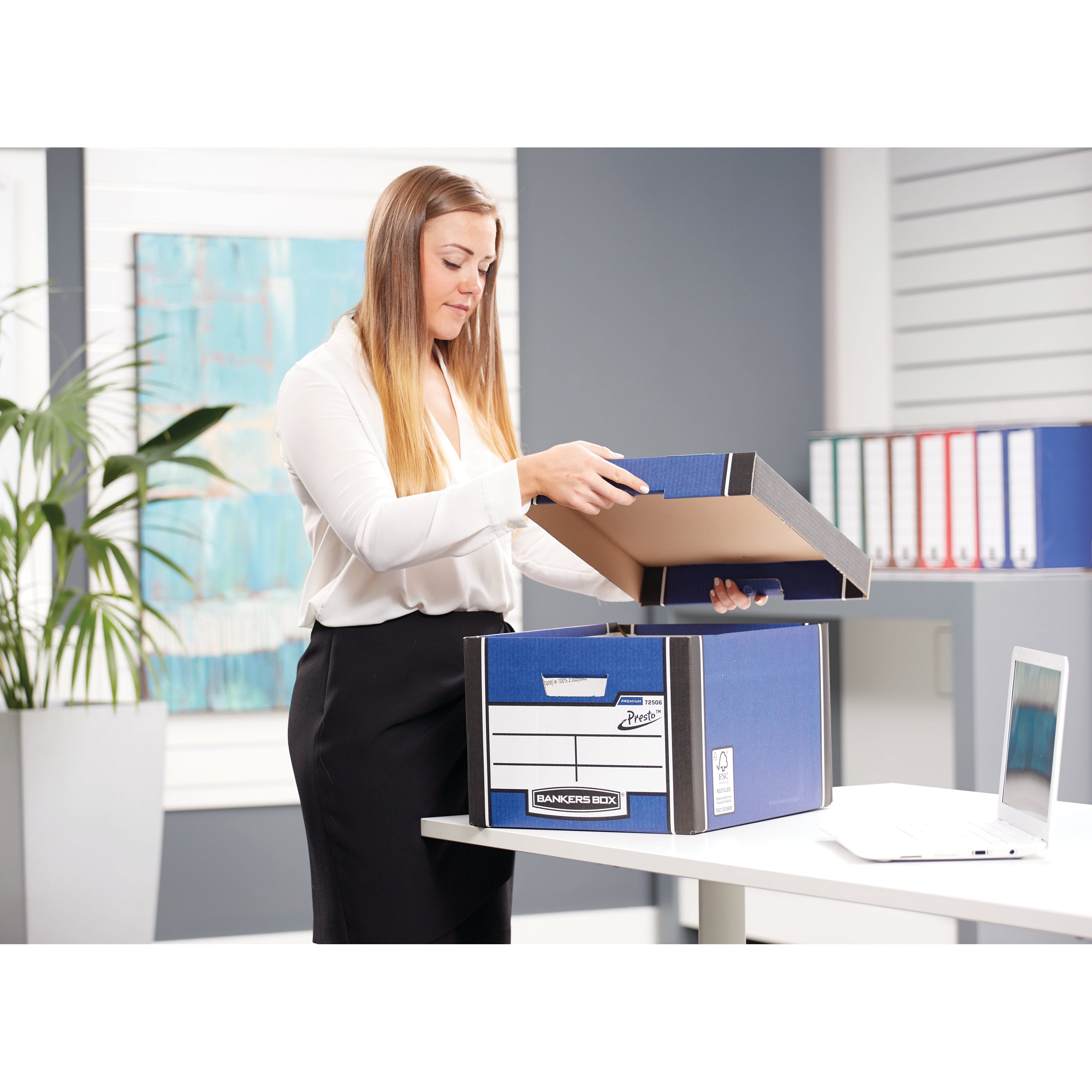 A neat stack of blue Bankers Box Premium Classic boxes, perfect for home or office storage.