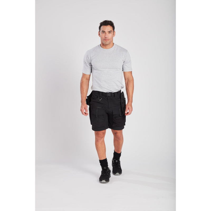 Worker wearing the Ultimate Modular trousers with a baselayer.