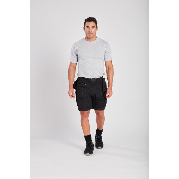Worker wearing the Ultimate Modular trousers with a baselayer.