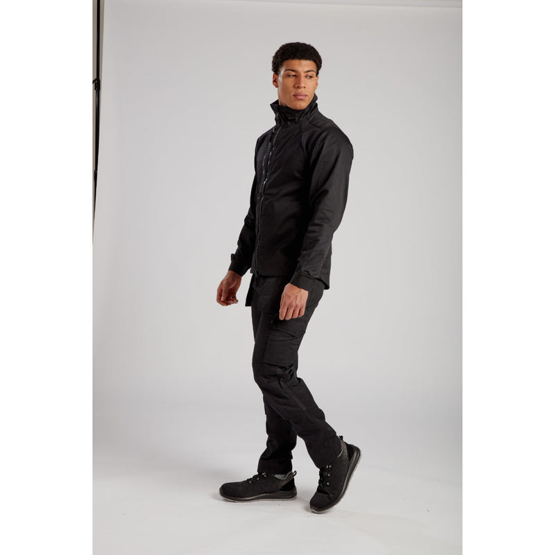 Portwest Eco Stretch Work Jacket rear view with full black uniform and helmet