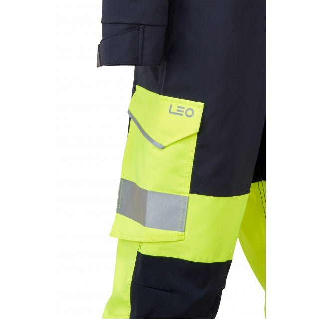 Close-up on the leg of the yellow/navy Leo Workwear Honeychurch coverall, showing stretch fabric and reflective bands.