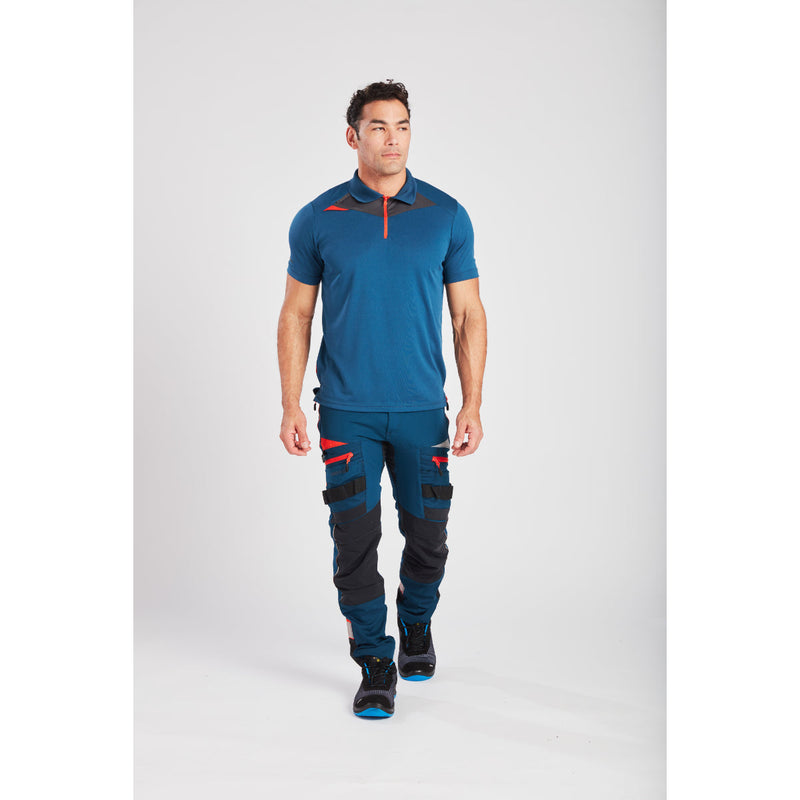 Worker in jacket and trousers, demonstrating active fit.