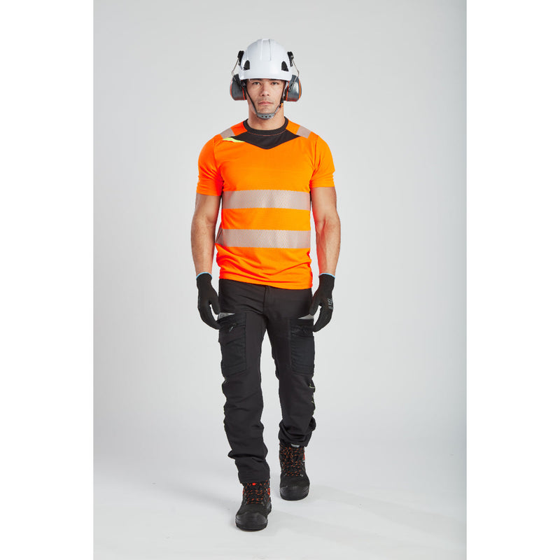 Model wearing the yellow Portwest DX4 Hi-Vis T-Shirt and work trousers, full front view.