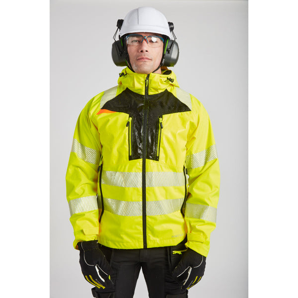 Worker protected from rain wearing Portwest DX4 Hi-Vis Jacket.