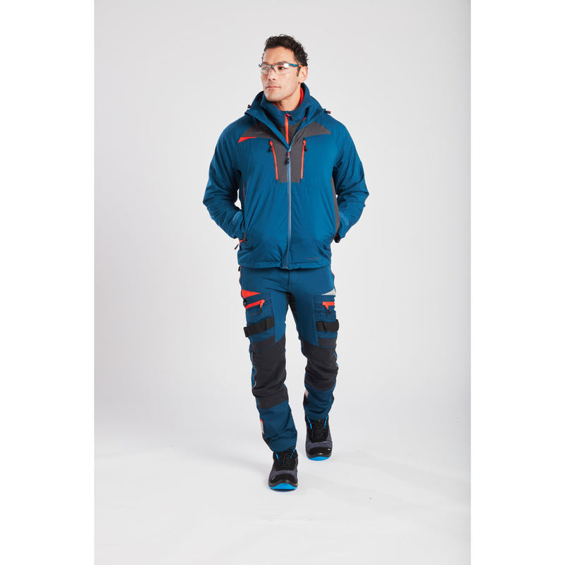 Back view of a man wearing a Portwest DX4 Quarter-Zip Hoodie and blue work trousers.