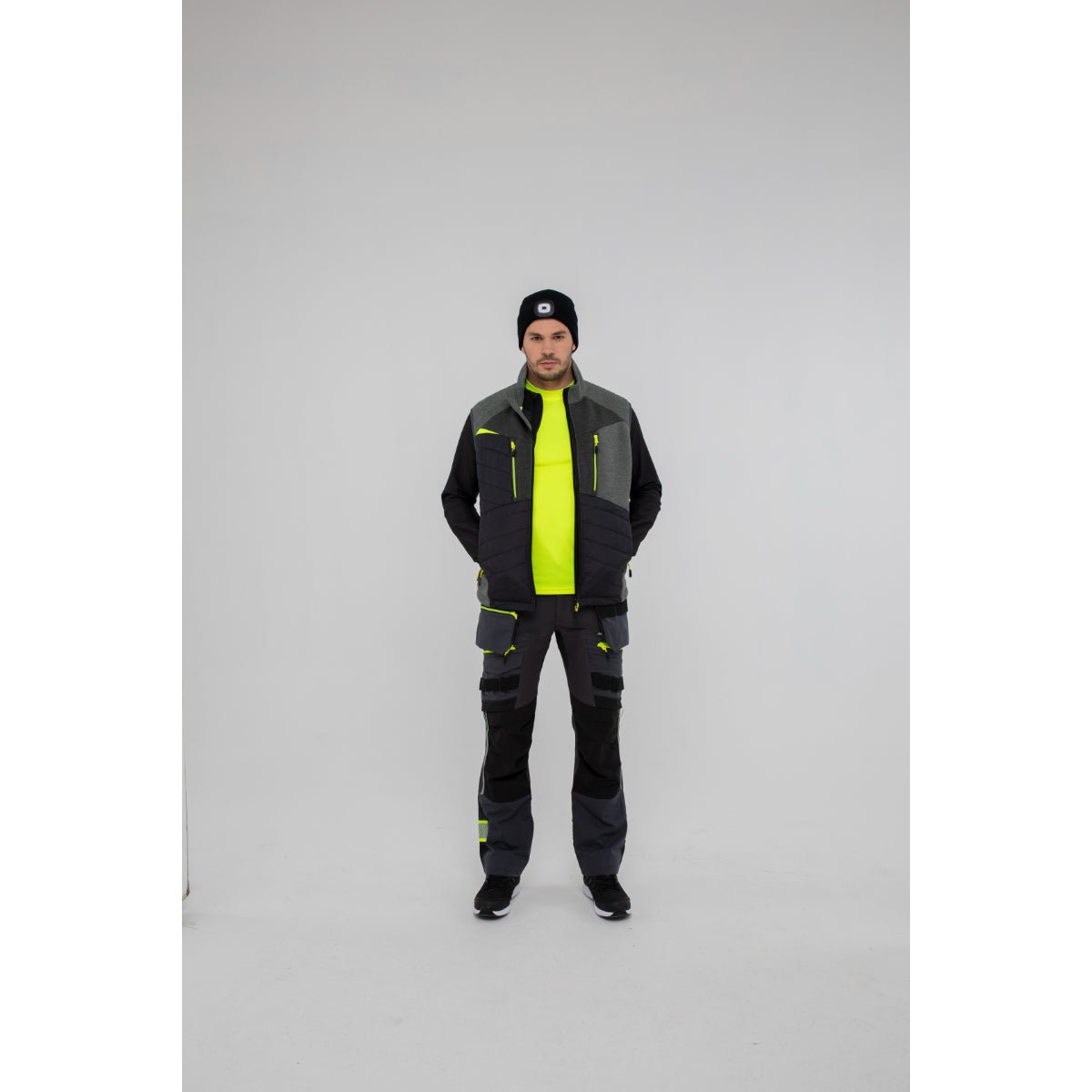 Man in Portwest DX4 Zip Base Layer showcasing comfort during physical tasks.