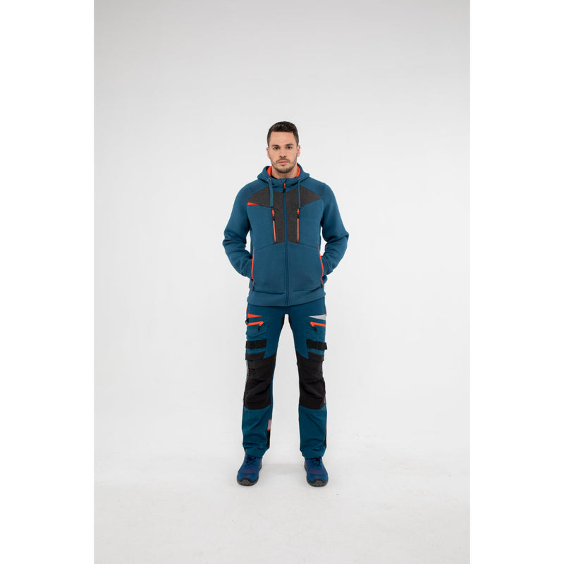 Man in Portwest DX4 Zipped Hoodie hands in pockets standing casually.