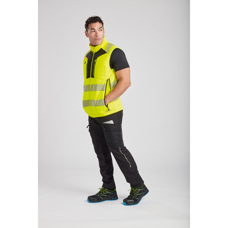 Side profile of a man in Portwest DX4 Hi-Vis Softshell Bodywarmer showing fit.