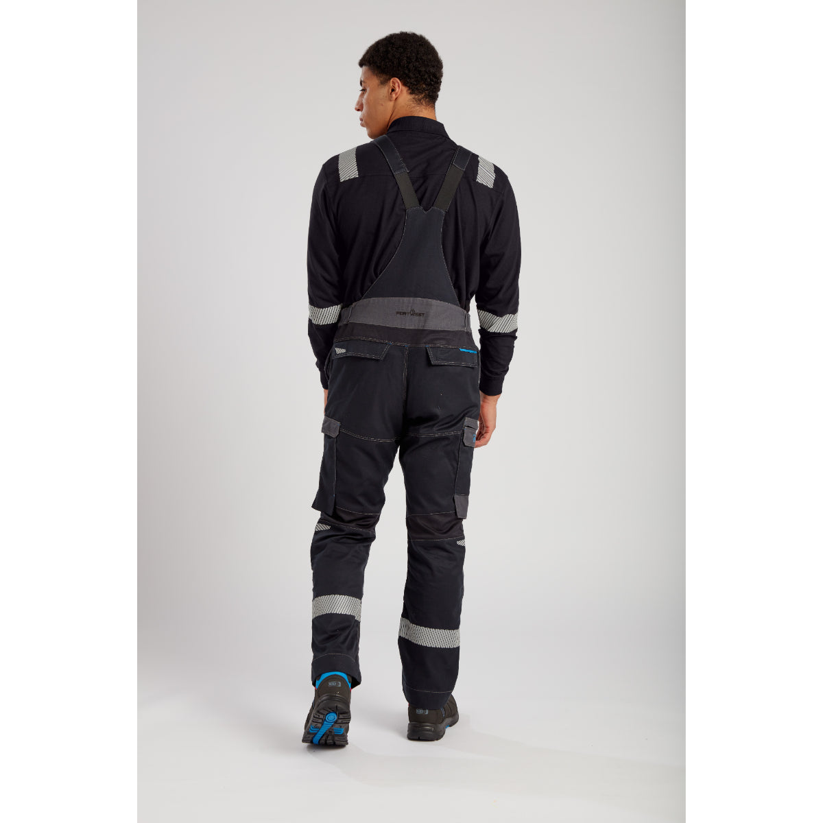 Portwest flame-resistant jacket and bib pants front angle