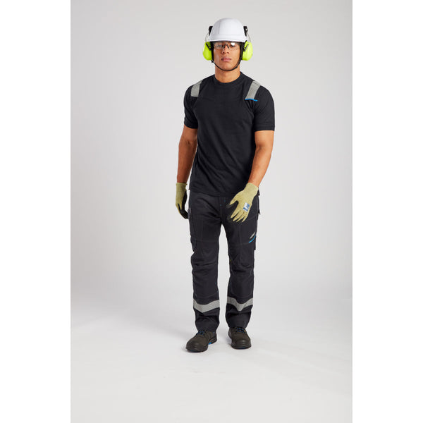 Construction worker in black T-shirt and work pants wearing white safety helmet, yellow earmuffs and clear safety glasses