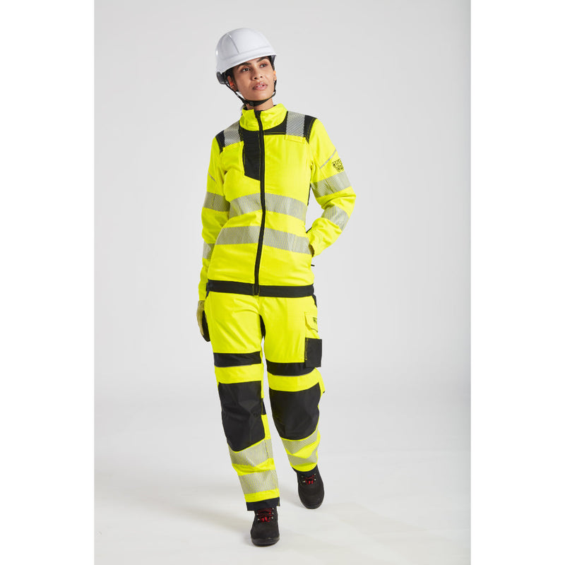Woman wearing complete yellow safety workwear with helmet, designed for construction site