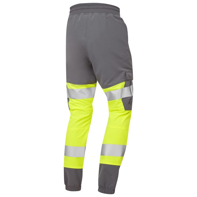 Back view of the Leo Workwear Hawkridge Class 1 jog trouser in yellow/grey, highlighting rear pocket and safety stripes.
