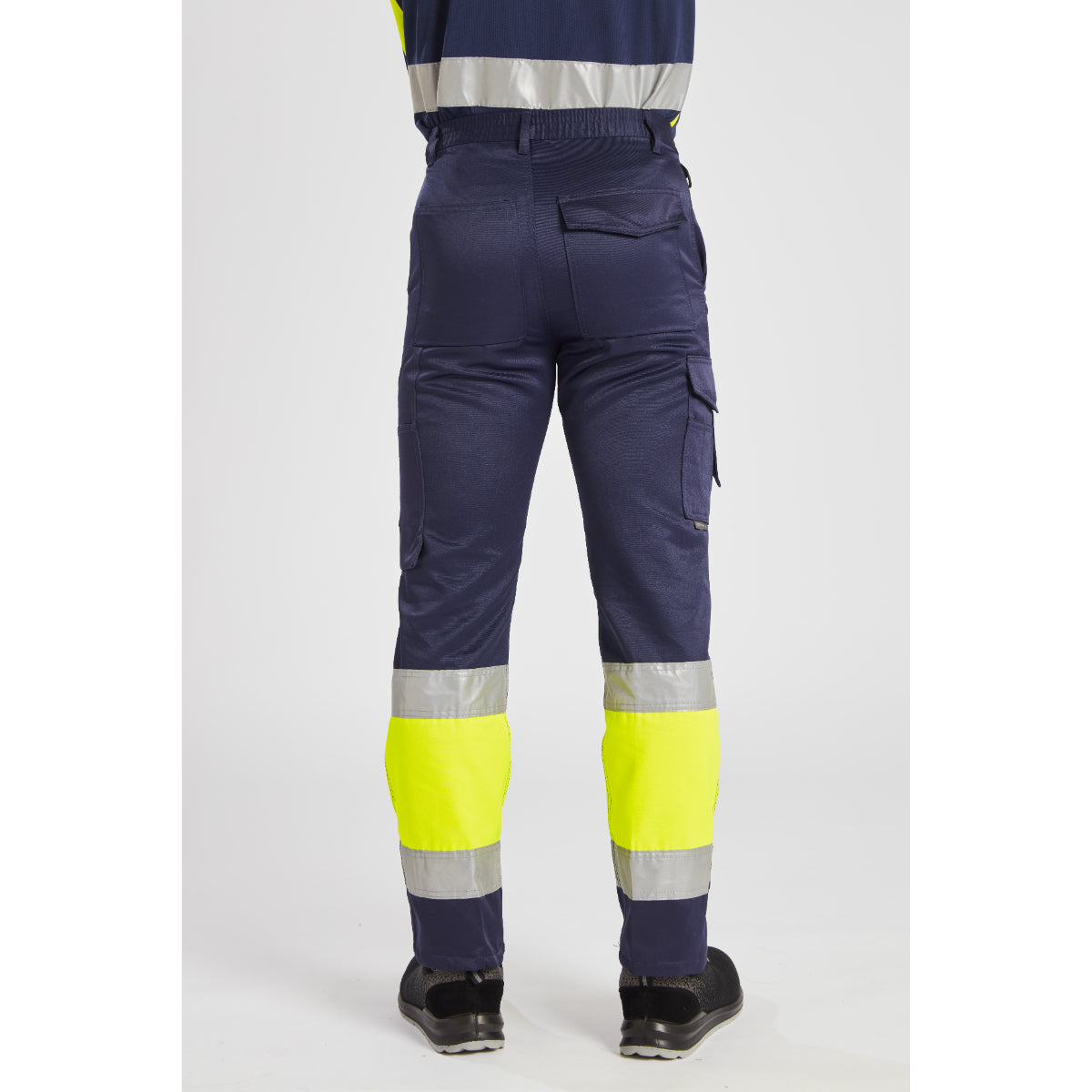 Close-up on the reflective tape and contrast panel of the trouser.