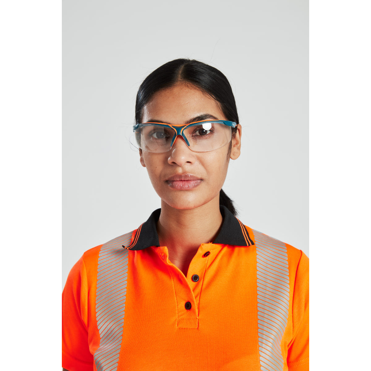 Close-up of front chest and collar area on Portwest women's hi-vis cotton polo