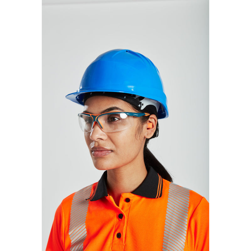 woman in orange hi-vis polo shirt with reflective strips and dark trousers