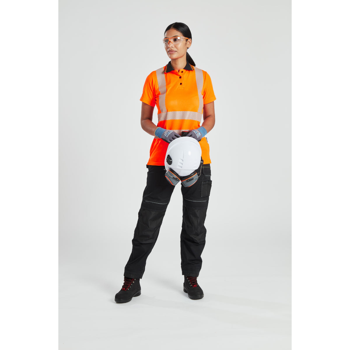 Model sitting to show the flexibility of the PW3 Women's Stretch Trouser.