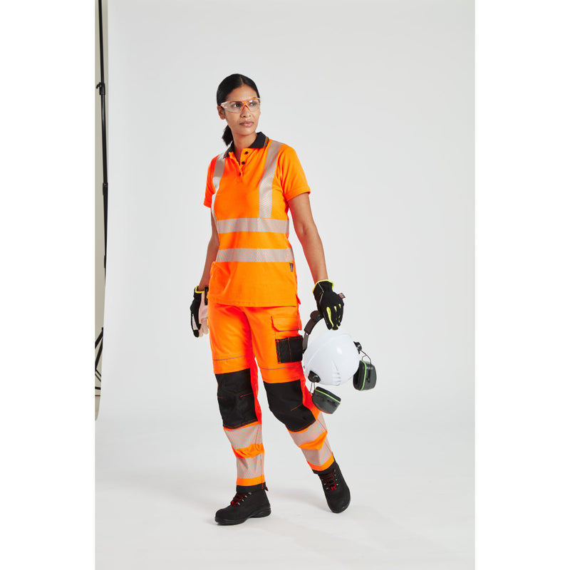 Female worker in Portwest PPE, including helmet and clip-on ear protectors.