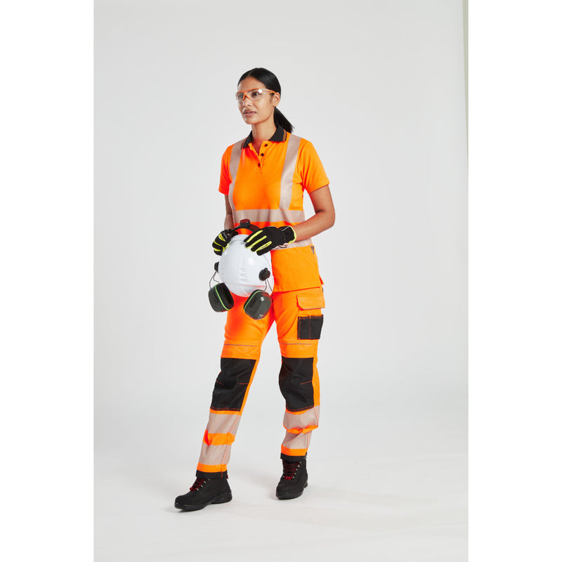 Female workers in discussion, showcasing Portwest safety helmets and gear.