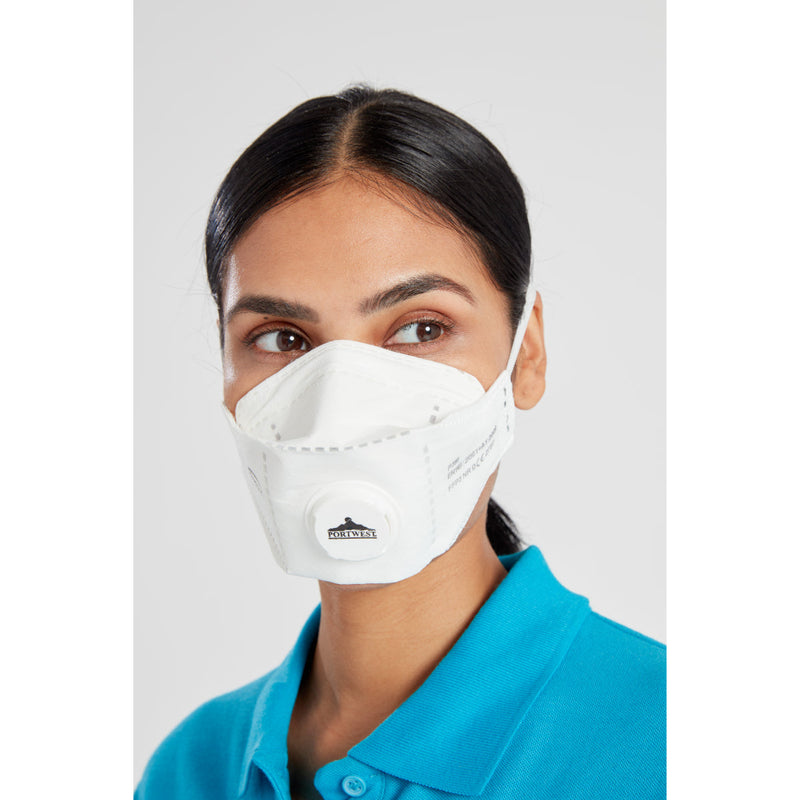 Worker protected from airborne particles with the Portwest P391 respirator.