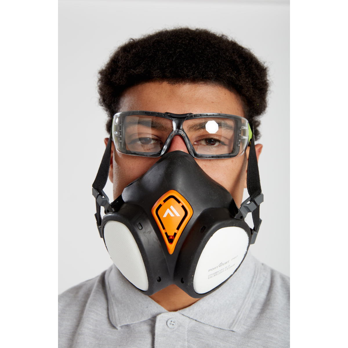 A person wearing the Portwest P440 A2P3 ready-to-use half mask respirator.
