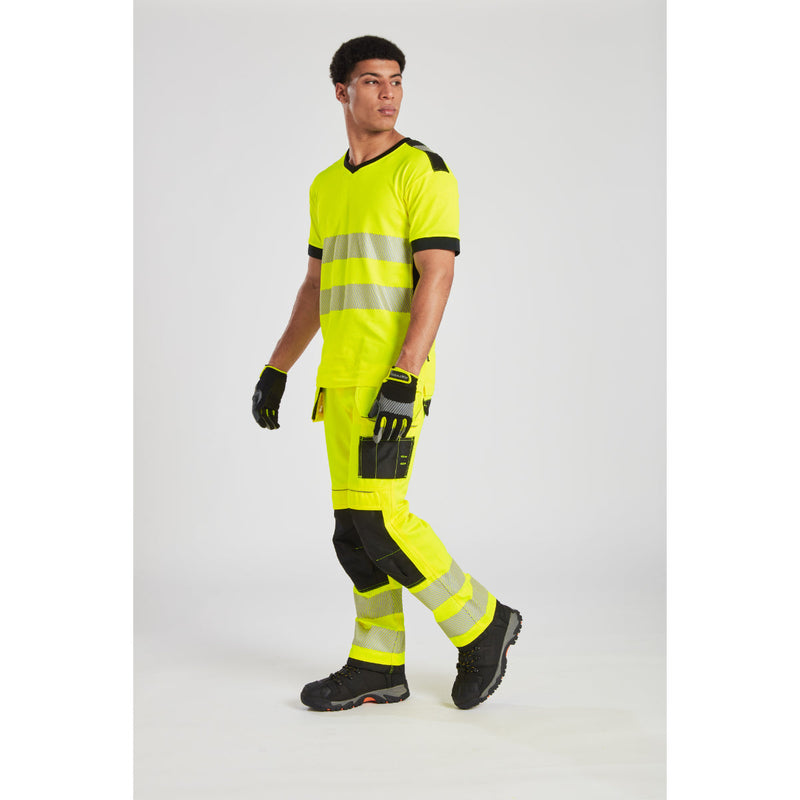 Industrial worker standing with Portwest S3 boots and high-visibility uniform